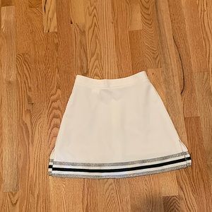 Varsity Spirit White Skirt w/emerald green + silver stripes